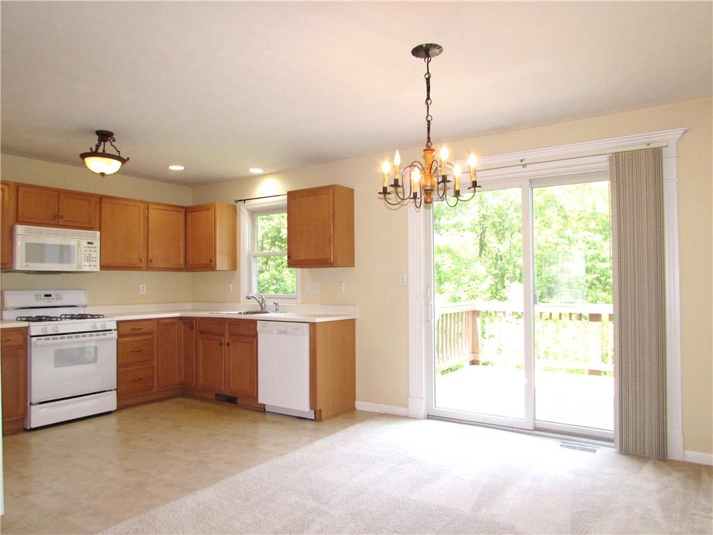6921 Spring Valley Lane Export, PA 15632 - Photo 11 of 41 The Dining Room is completely Open to the Kitchen for seamless Entertaining.