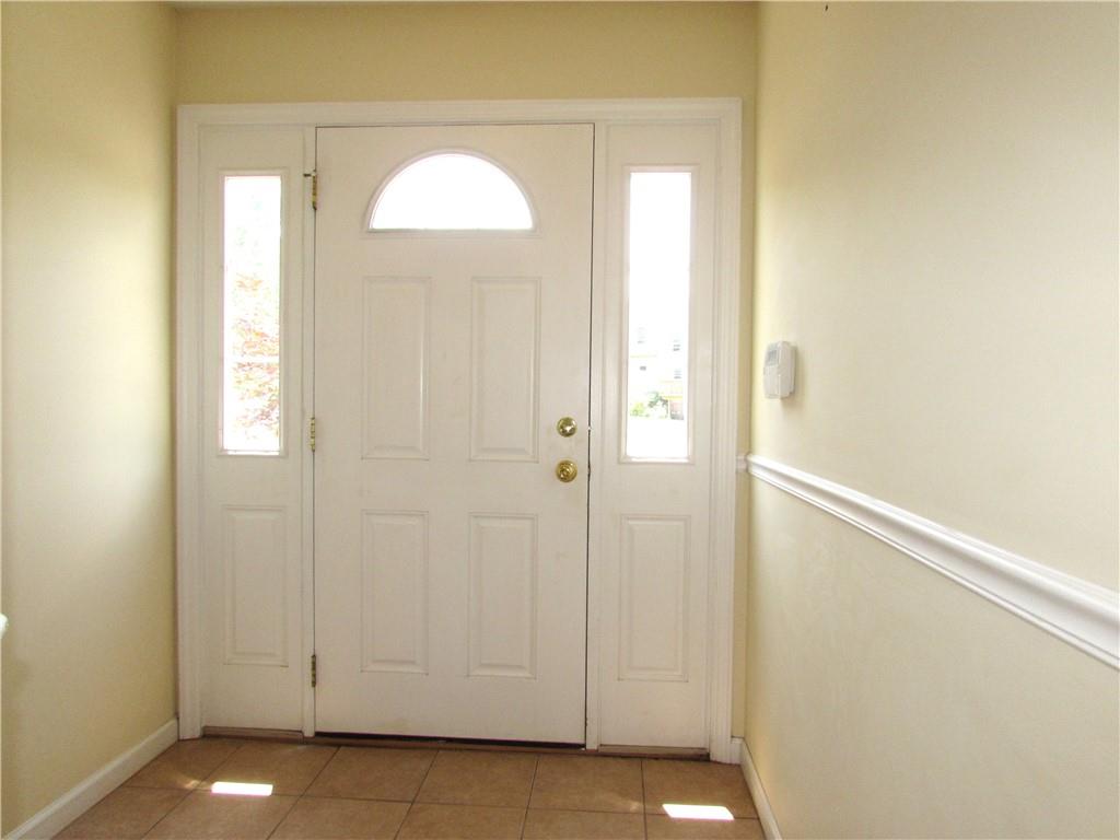 6921 Spring Valley Lane Export, PA 15632 - Photo 2 of 41 Ceramic Flooring in Entry, Laundry Room, & Den.