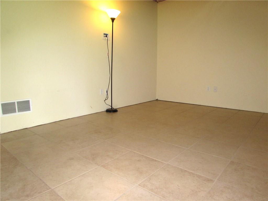 6921 Spring Valley Lane Export, PA 15632 - Photo 33 of 41 Ceramic Flooring in this Den, which can be a Home Office or Exercise Space.
