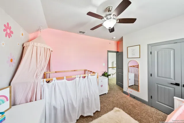 a view of a patio with a table chairs and a table