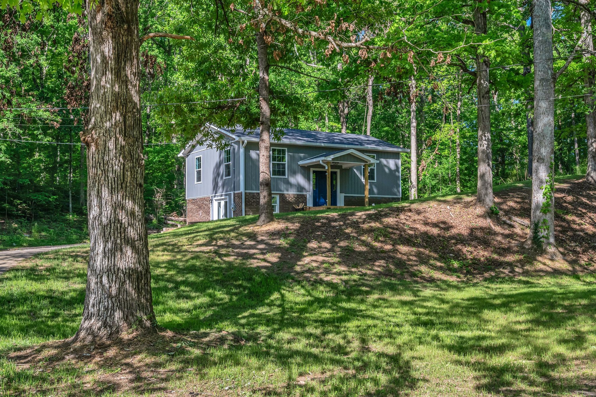120 Bern Street Waverly, TN 37185 - Photo 2 of 36 a view of a house with a yard