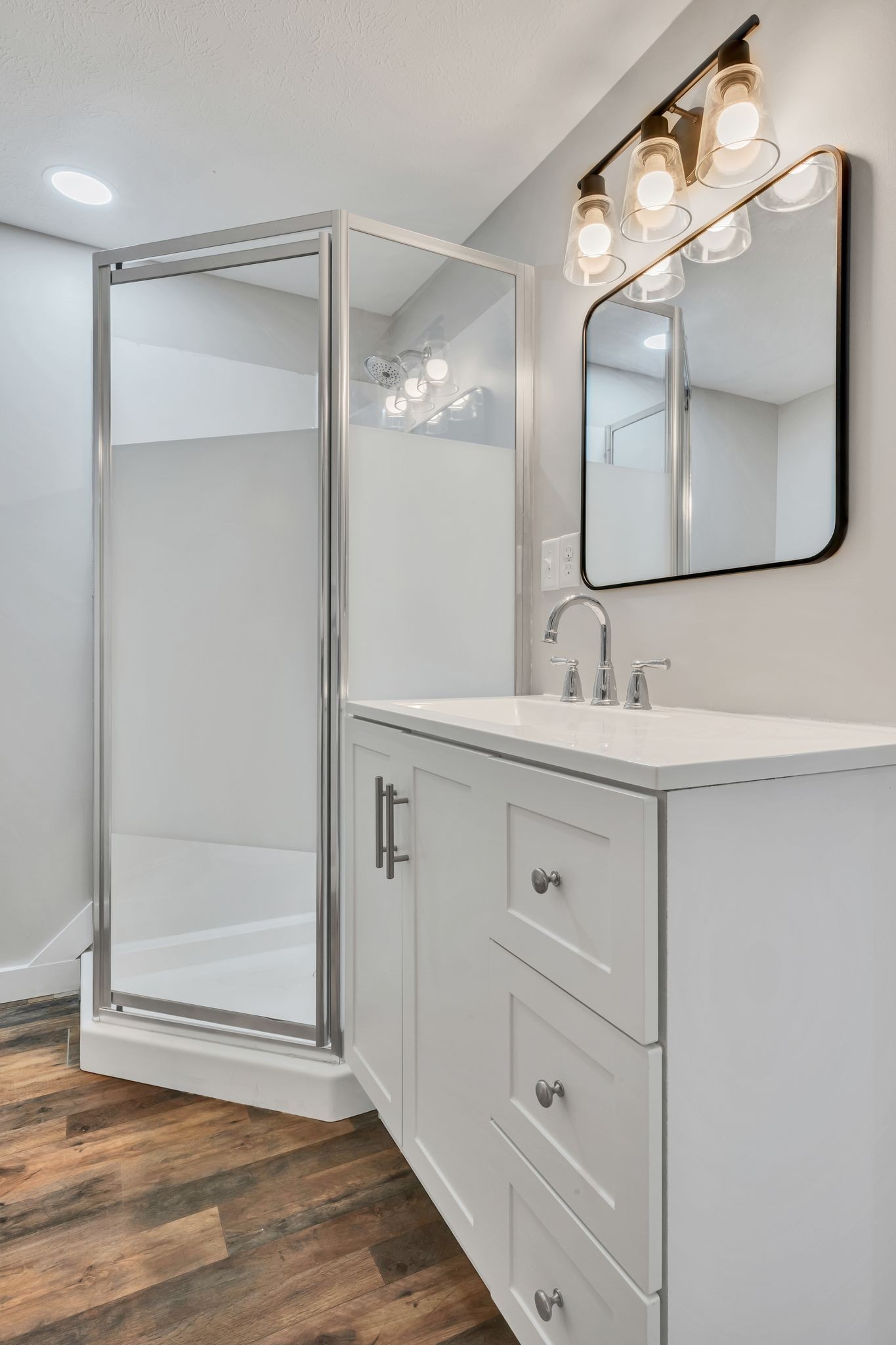 120 Bern Street Waverly, TN 37185 - Photo 31 of 36 a bathroom with a double vanity sink and mirror