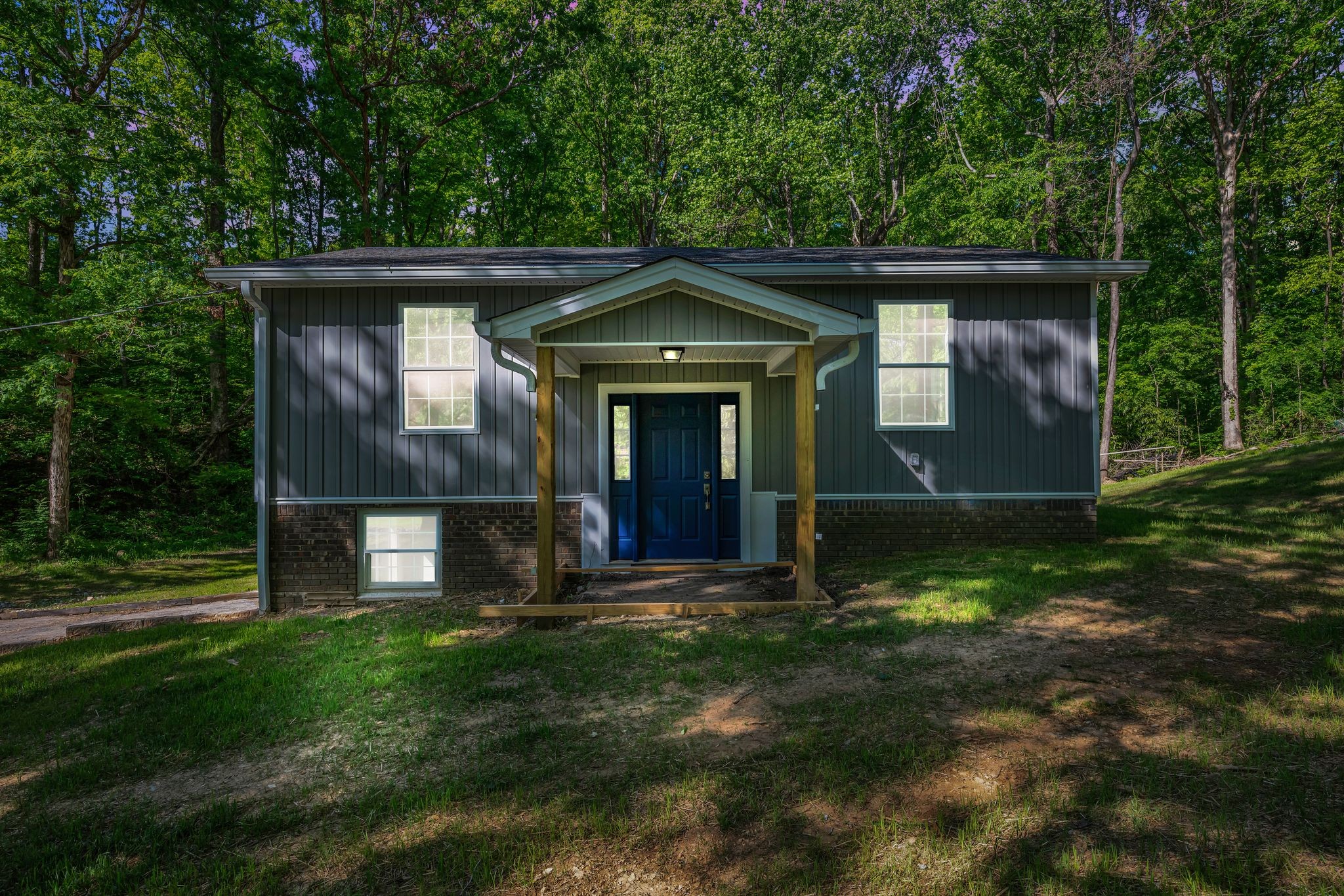 120 Bern Street Waverly, TN 37185 - Photo 36 of 36 a front view of a house with a yard