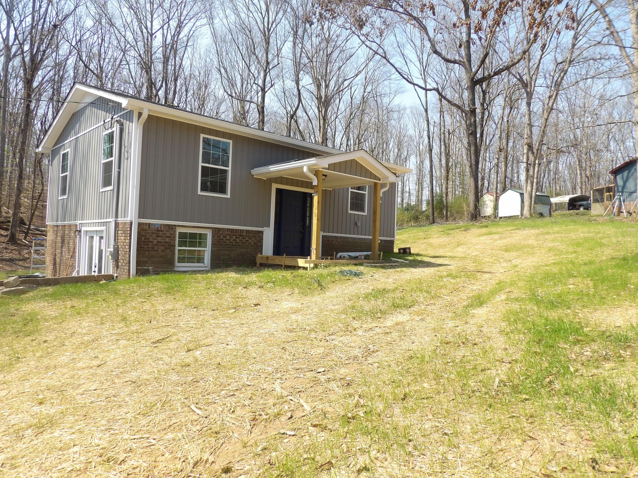 120 Bern Street Waverly, TN 37185 - Photo 8 of 36 a view of a house with a yard