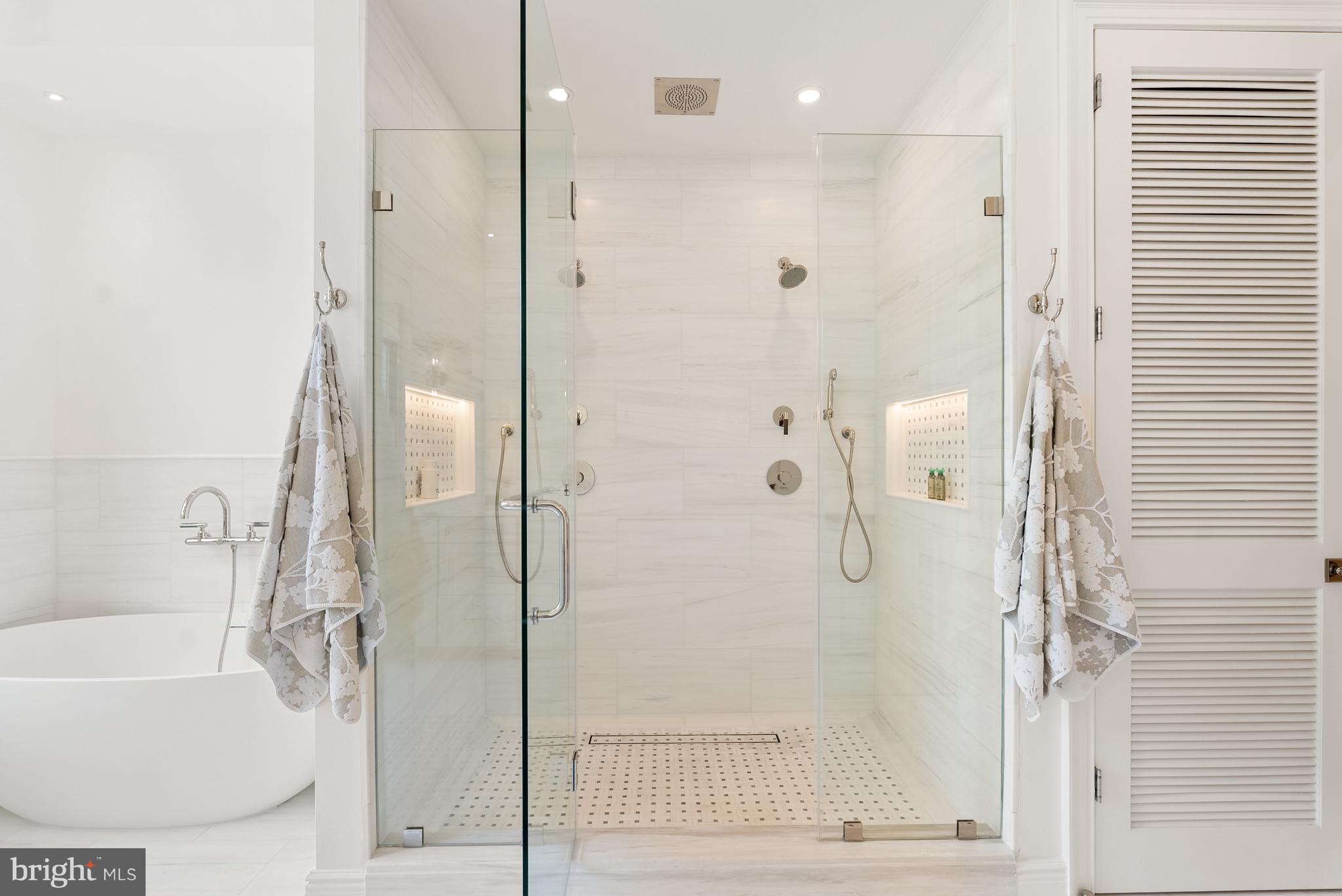 1611 Riggs Place Northwest Washington, DC 20009 - Photo 24 of 56 a bathroom with a bathtub and a shower