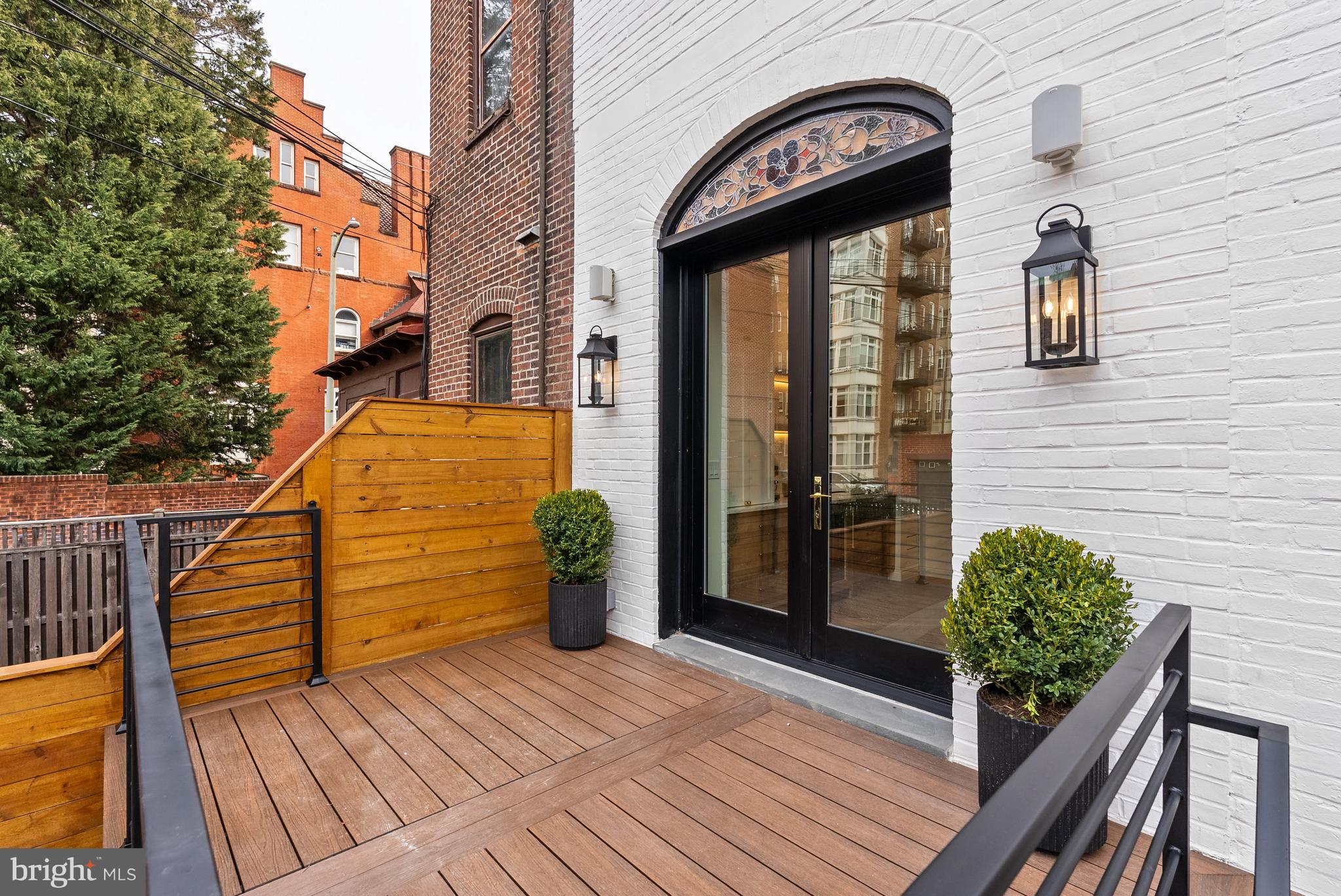 1611 Riggs Place Northwest Washington, DC 20009 - Photo 49 of 56 a front view of a house with entryway