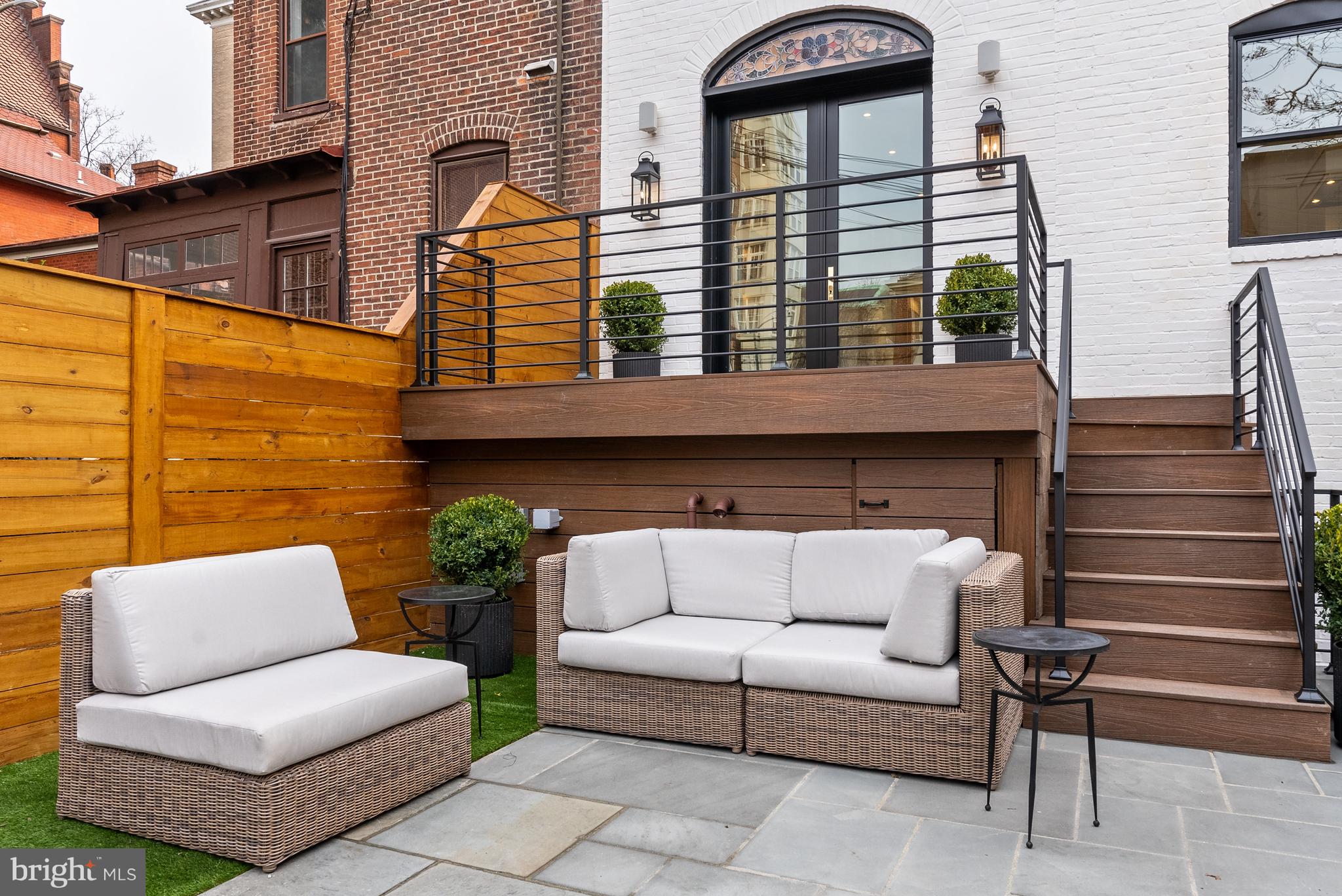 1611 Riggs Place Northwest Washington, DC 20009 - Photo 50 of 56 a view of a two couches in the patio