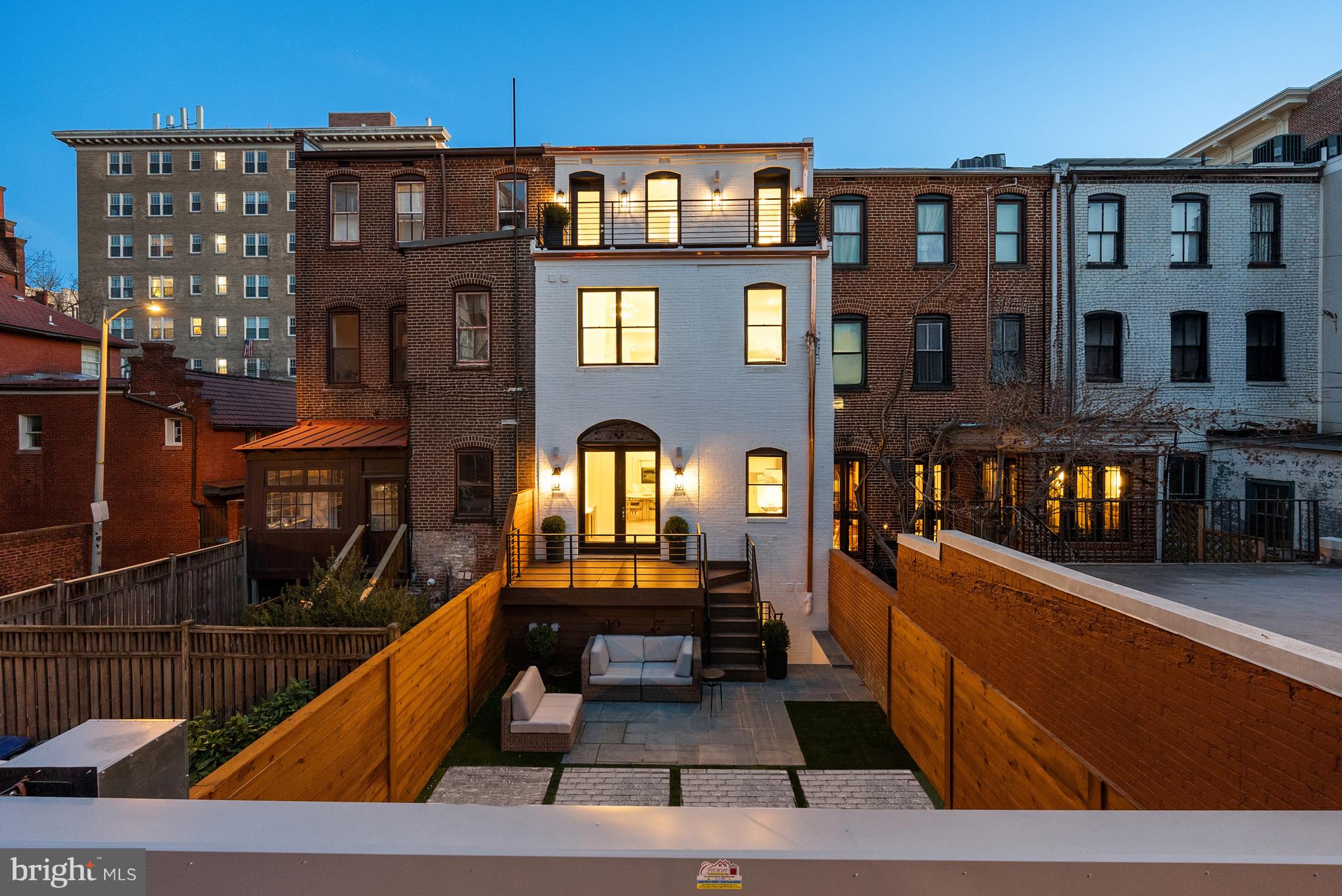 1611 Riggs Place Northwest Washington, DC 20009 - Photo 54 of 56 a view of a building with many windows