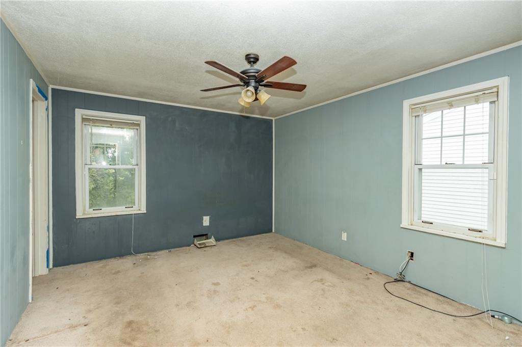 406 Violet Drive Lower Burrell, PA 15068 - Photo 13 of 15 a bedroom with a bed and a window