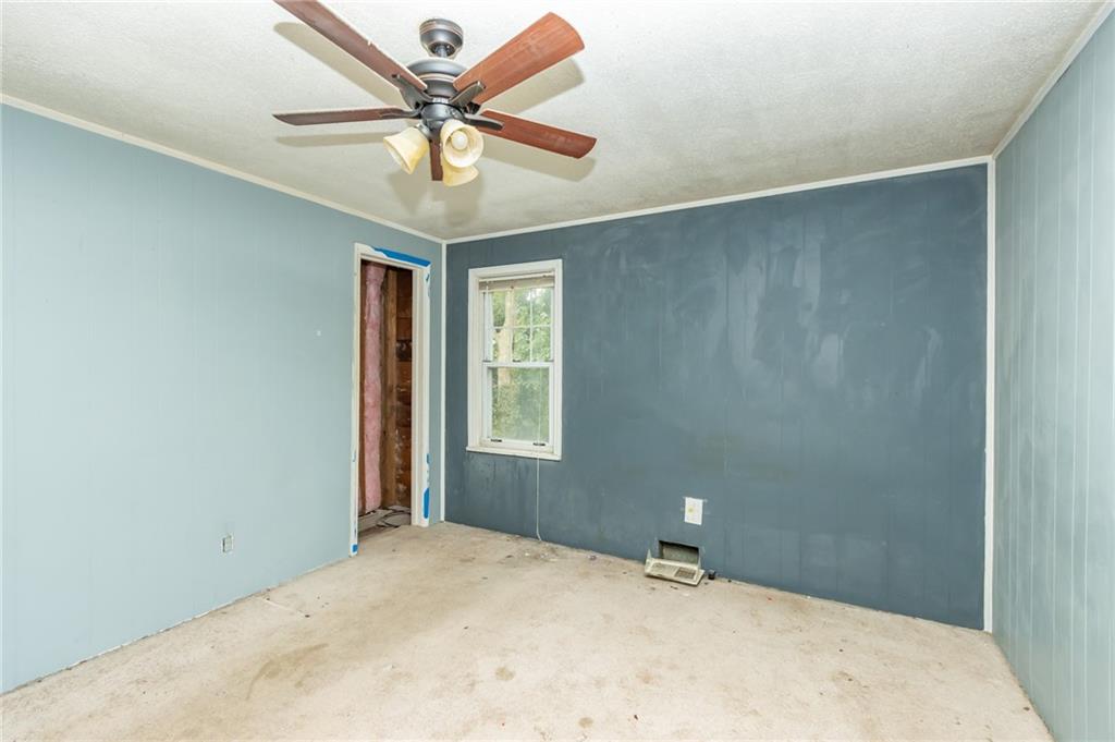 406 Violet Drive Lower Burrell, PA 15068 - Photo 14 of 15 a bedroom with a fan and a window