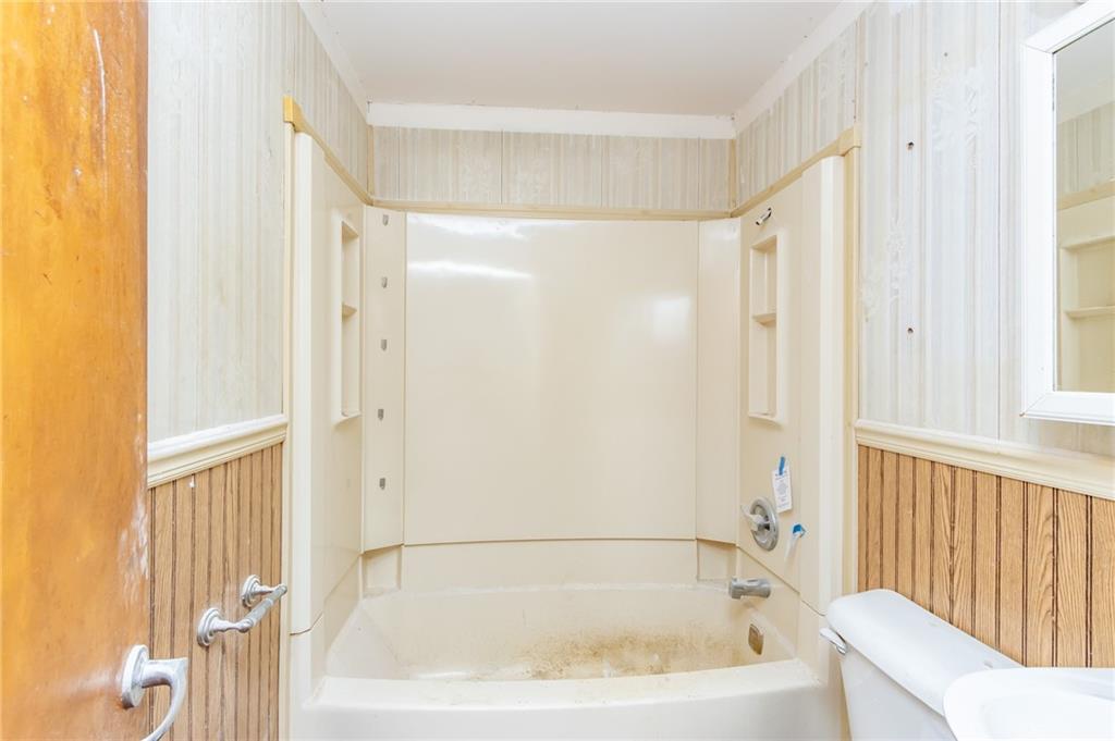 406 Violet Drive Lower Burrell, PA 15068 - Photo 15 of 15 a bathroom with a bathtub and a shower