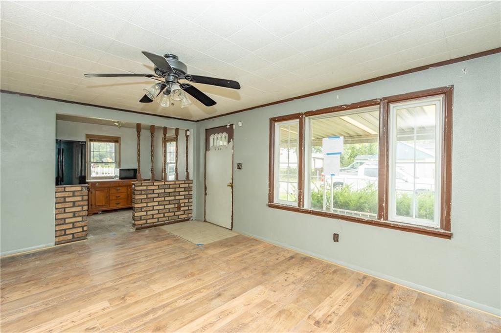 406 Violet Drive Lower Burrell, PA 15068 - Photo 5 of 15 a bedroom with furniture window and wooden floor