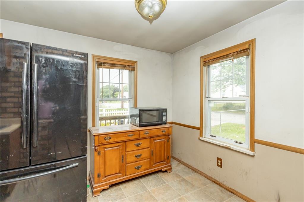 406 Violet Drive Lower Burrell, PA 15068 - Photo 8 of 15 a kitchen with a window a sink and a window
