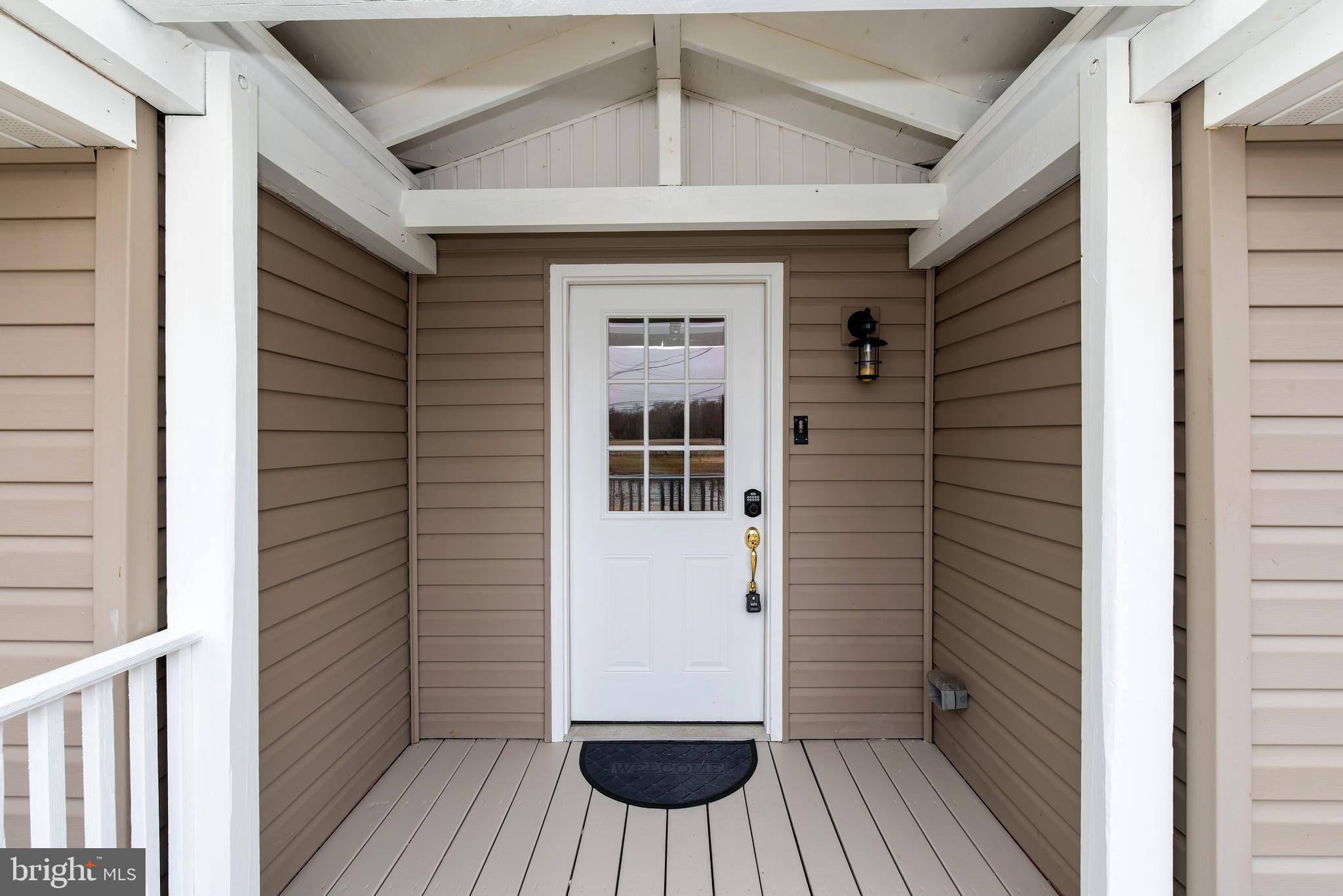 117 Quaker Neck Road Salem, NJ 08079 - Photo 3 of 51 a view of porch with wooden floor and a window