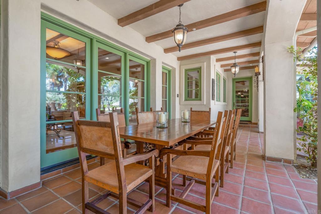 7187 Via De Maya Rancho Santa Fe, CA 92067 - Photo 6 of 10 a view of a dining room with furniture and chandelier