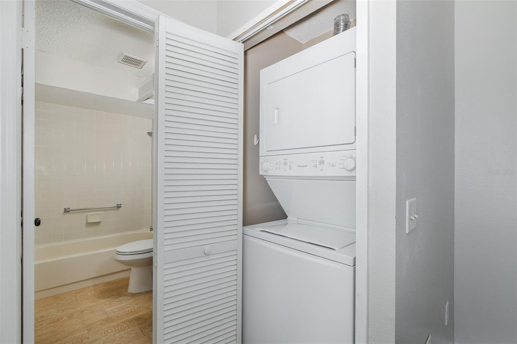 7900 Hardwick Drive, Unit 827 New Port Richey, FL 34653 - Photo 12 of 27 a bathroom with a toilet and a shower