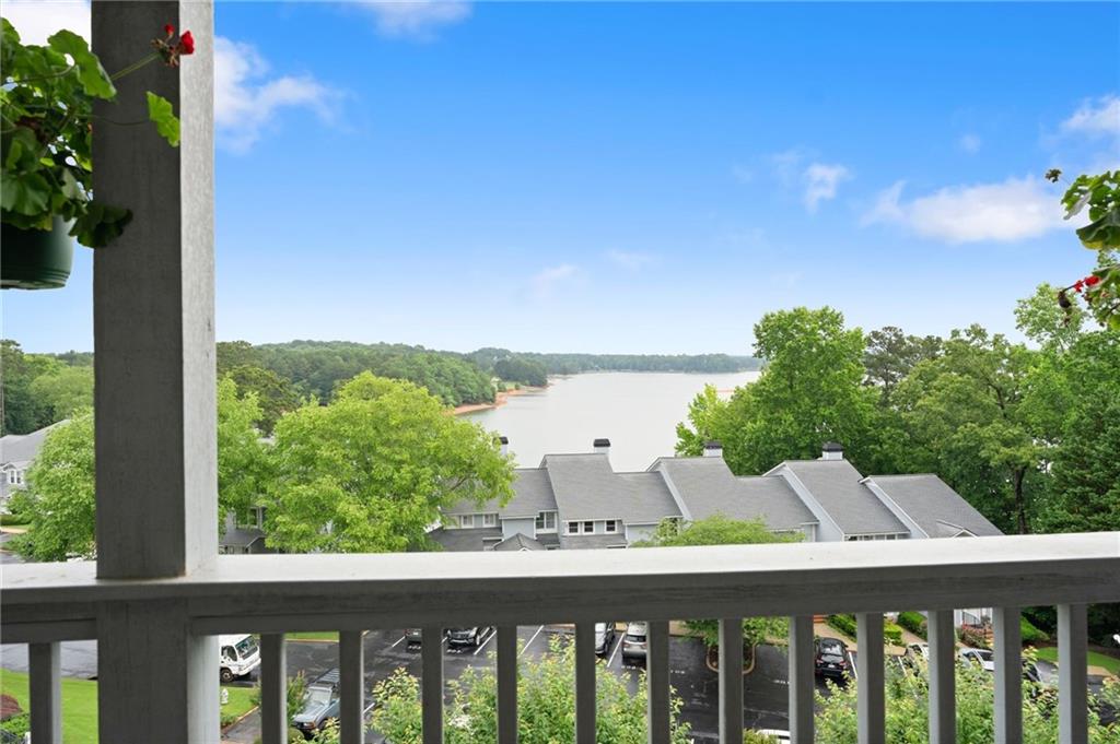 2300 Habersham Marina Road, Unit 302 Cumming, GA 30041 - Photo 27 of 31 a balcony with an outdoor space