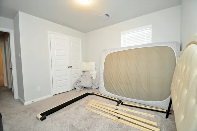 a room with furniture and a window