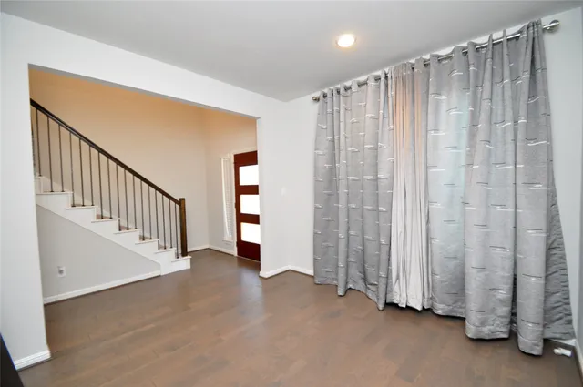 a view of hallway with stairs