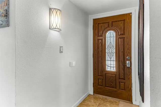 view of empty room with windows