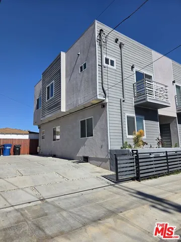 a front view of house with stairs