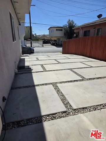 a view of a backyard of the house