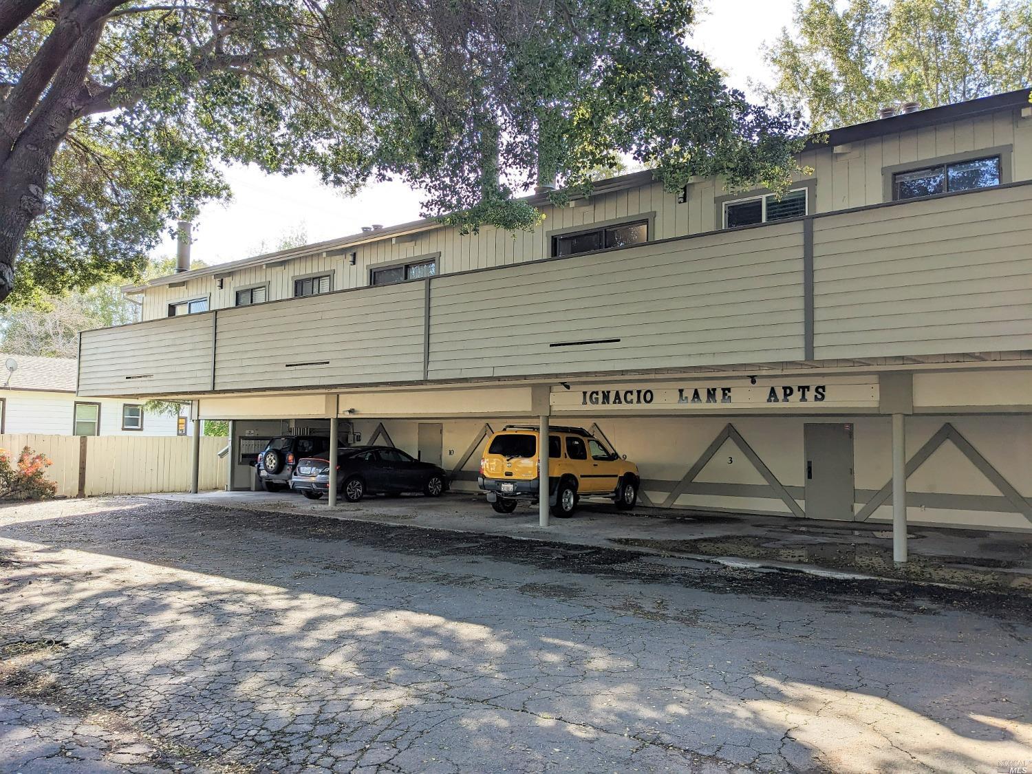 a view of a car park in front of house