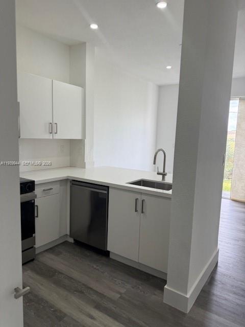 17820 Northwest 73rd Avenue, Unit 1011 Hialeah, FL 33015 - Photo 2 of 11 a kitchen with a sink cabinets and wooden floor