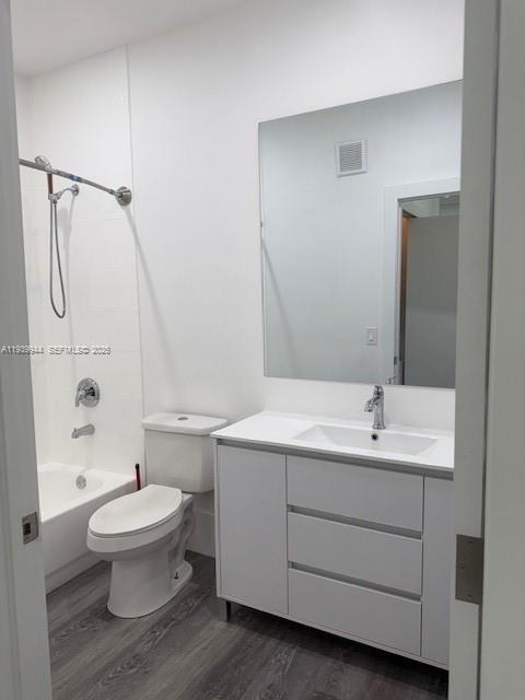 17820 Northwest 73rd Avenue, Unit 1011 Hialeah, FL 33015 - Photo 6 of 11 a bathroom with a toilet sink and shower