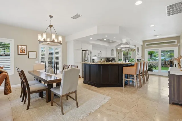 a view of a livingroom with furniture window and wooden floor