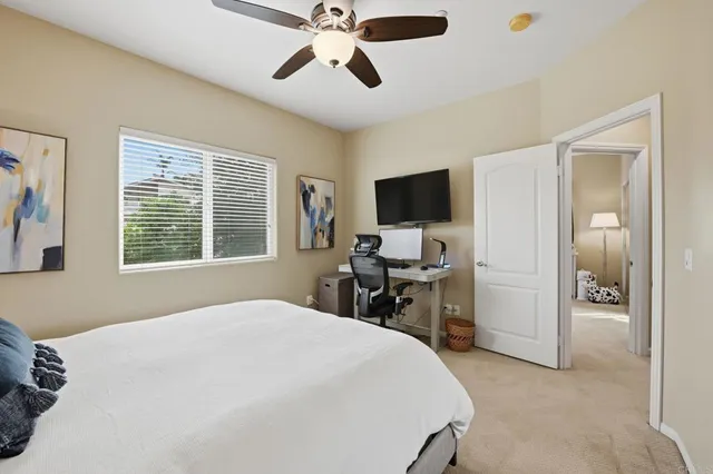 a spacious bathroom with sink shower and bathtub