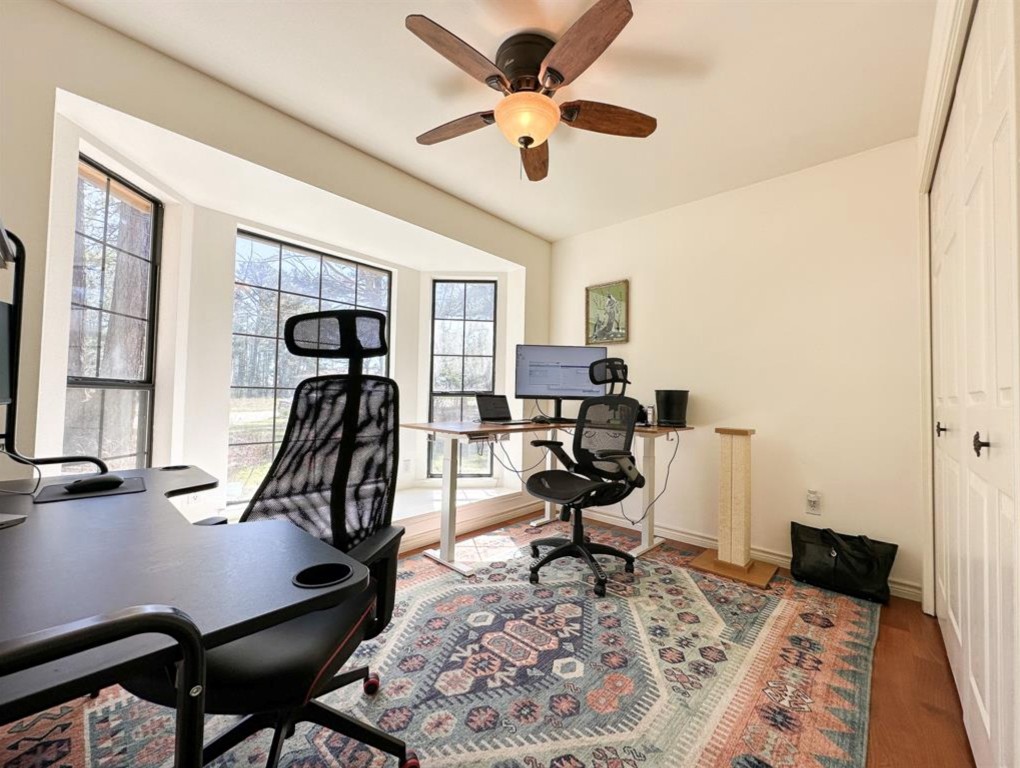 251 Pine View Loop Bastrop, TX 78602 - Photo 18 of 30 a view of a workspace with furniture and a window