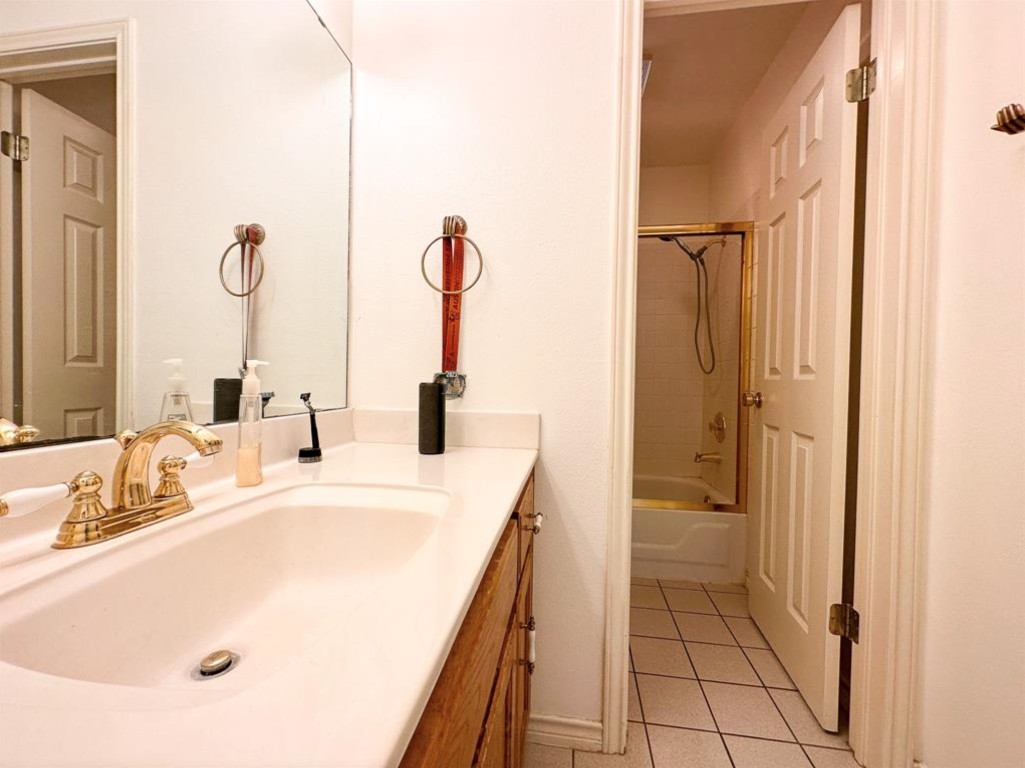251 Pine View Loop Bastrop, TX 78602 - Photo 20 of 30 a bathroom with a sink and mirror