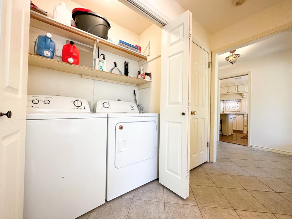 251 Pine View Loop Bastrop, TX 78602 - Photo 22 of 30 a utility room with dryer and washer
