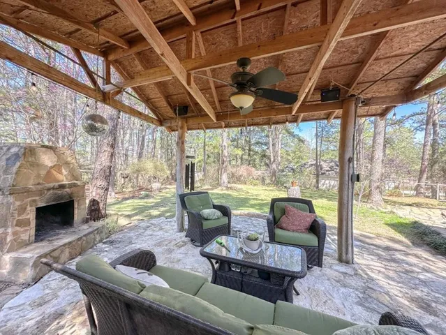 a view of a balcony with wooden floor