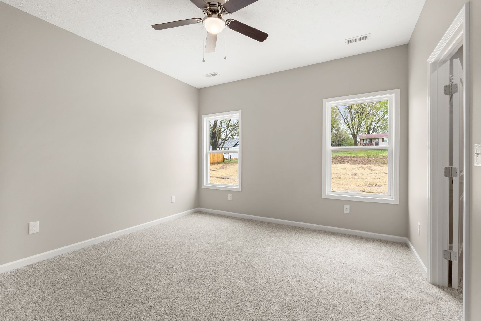 803 Shepard Street South Winchester, TN 37398 - Photo 19 of 33 an empty room with a window and a fan