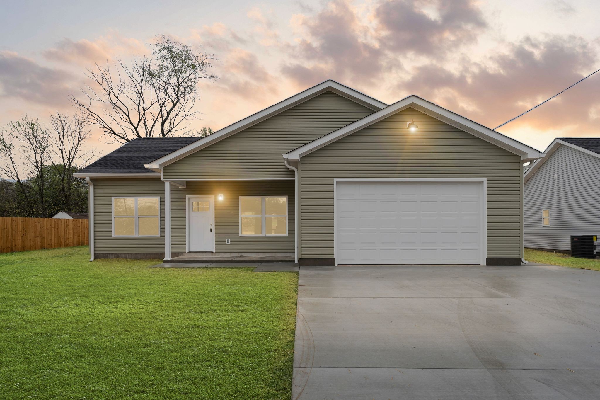 803 Shepard Street South Winchester, TN 37398 - Photo 30 of 33 a front view of house with yard and garage