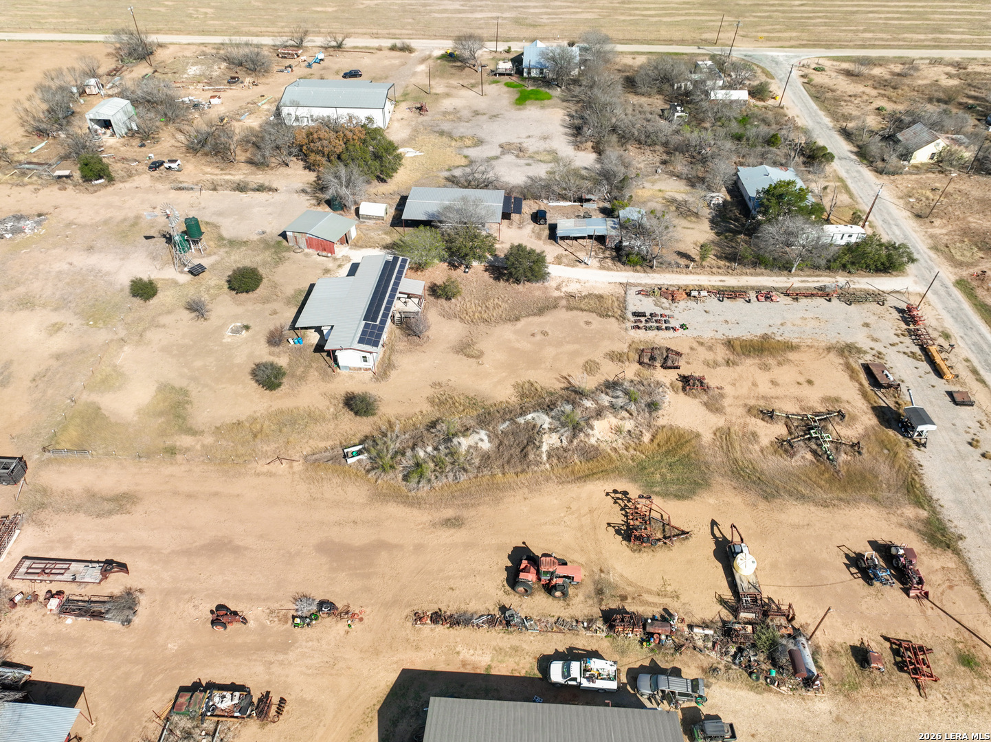4919 County Road 545 Devine, TX 78016 - Photo 30 of 38 an aerial view of residential houses with outdoor space