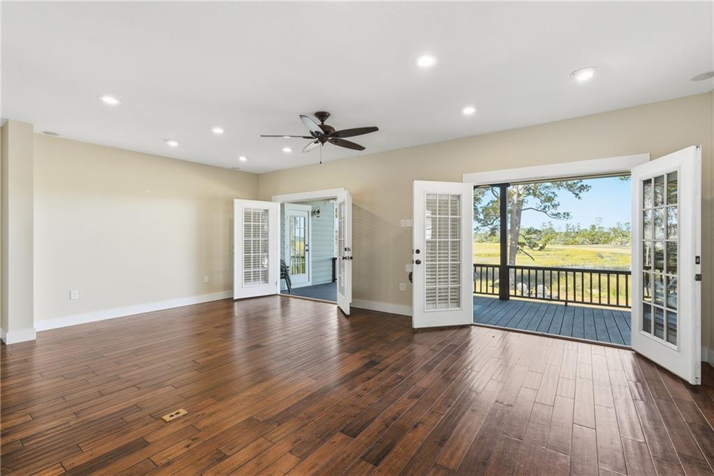 1261 Otter Slide Loop Townsend, GA 31331 - Photo 11 of 52 a view of entryway with wooden floor