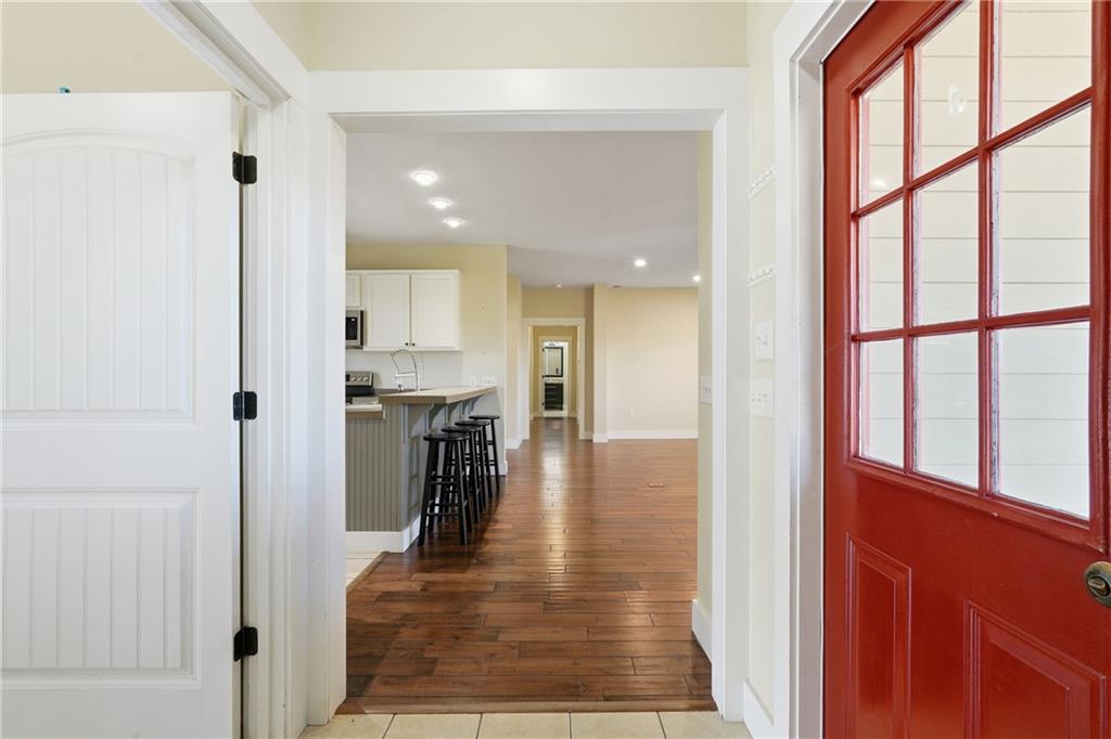 1261 Otter Slide Loop Townsend, GA 31331 - Photo 17 of 52 a view of a hallway view with large windows