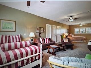 1261 Otter Slide Loop Townsend, GA 31331 - Photo 36 of 52 a living room with furniture ceiling fan and a window