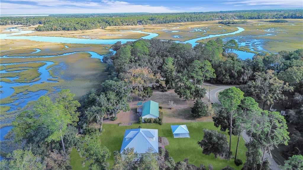 1261 Otter Slide Loop Townsend, GA 31331 - Photo 49 of 52 an aerial view of a house with a lake view