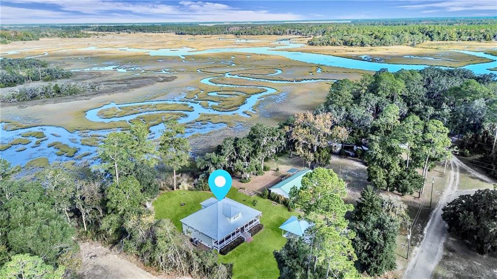 1261 Otter Slide Loop Townsend, GA 31331 - Photo 50 of 52 a view of a lake with a outdoor space