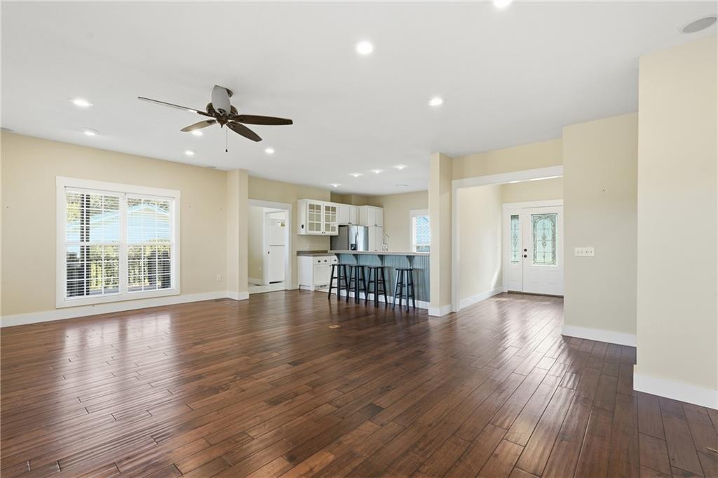 1261 Otter Slide Loop Townsend, GA 31331 - Photo 9 of 52 a view of a livingroom with furniture wooden floor and a window