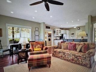 1261 Otter Slide Loop Townsend, GA 31331 - Photo 10 of 52 a living room with furniture kitchen view and a window