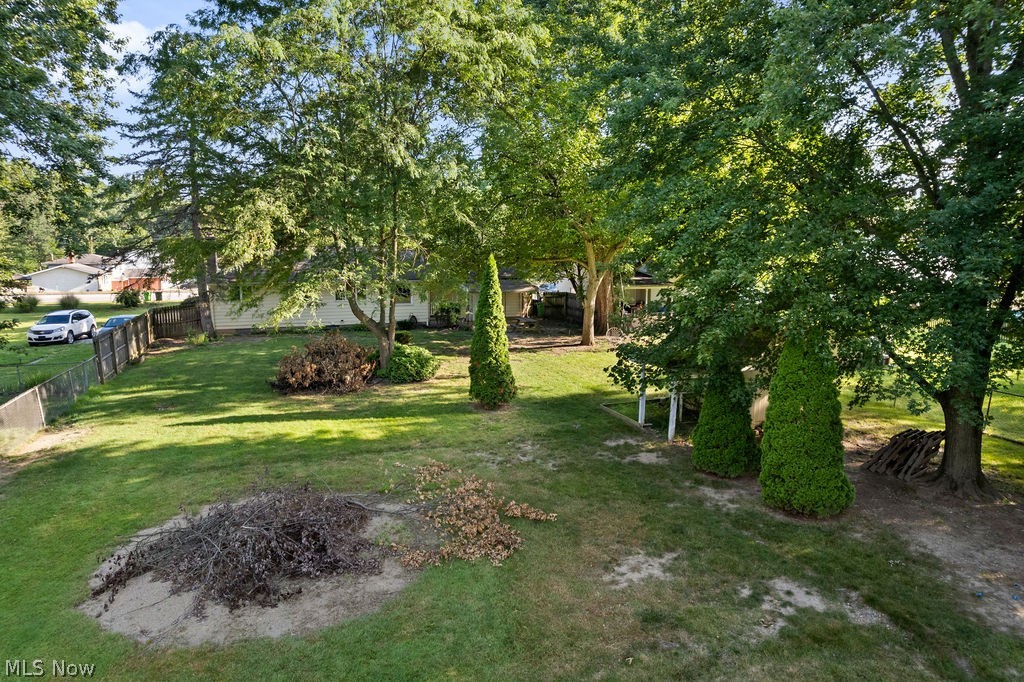 1903 Graham Road Stow, OH 44224 - Photo 27 of 29 Expansive green lawn with mature trees and established evergreens