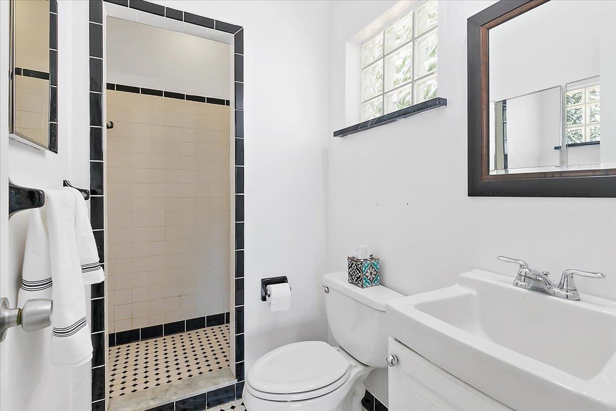 108 Ferrol Road St. Augustine, FL 32084 - Photo 20 of 39 a bathroom with a sink toilet and shower