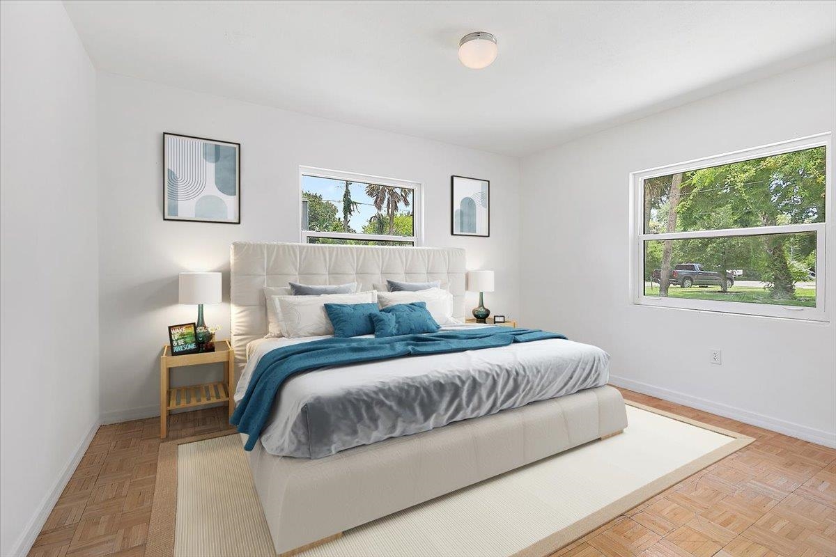 108 Ferrol Road St. Augustine, FL 32084 - Photo 21 of 39 a bedroom with a bed and a window