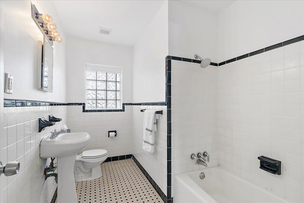 108 Ferrol Road St. Augustine, FL 32084 - Photo 24 of 39 a bathroom with a sink toilet and shower