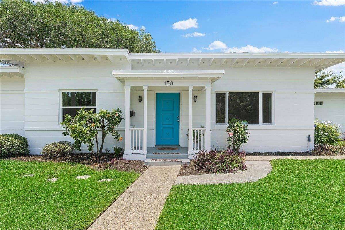 108 Ferrol Road St. Augustine, FL 32084 - Photo 7 of 39 a view of a house with garden and plants